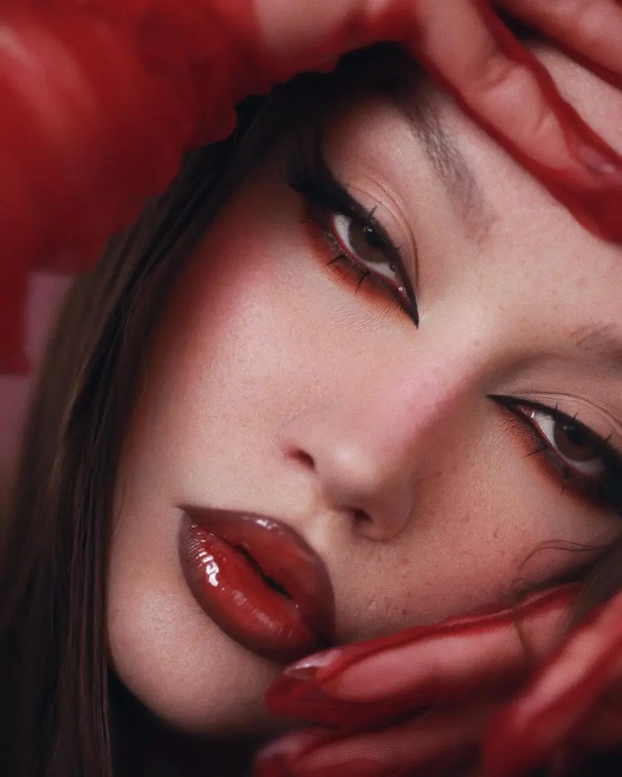 Sultry dark feminine makeup with bold details