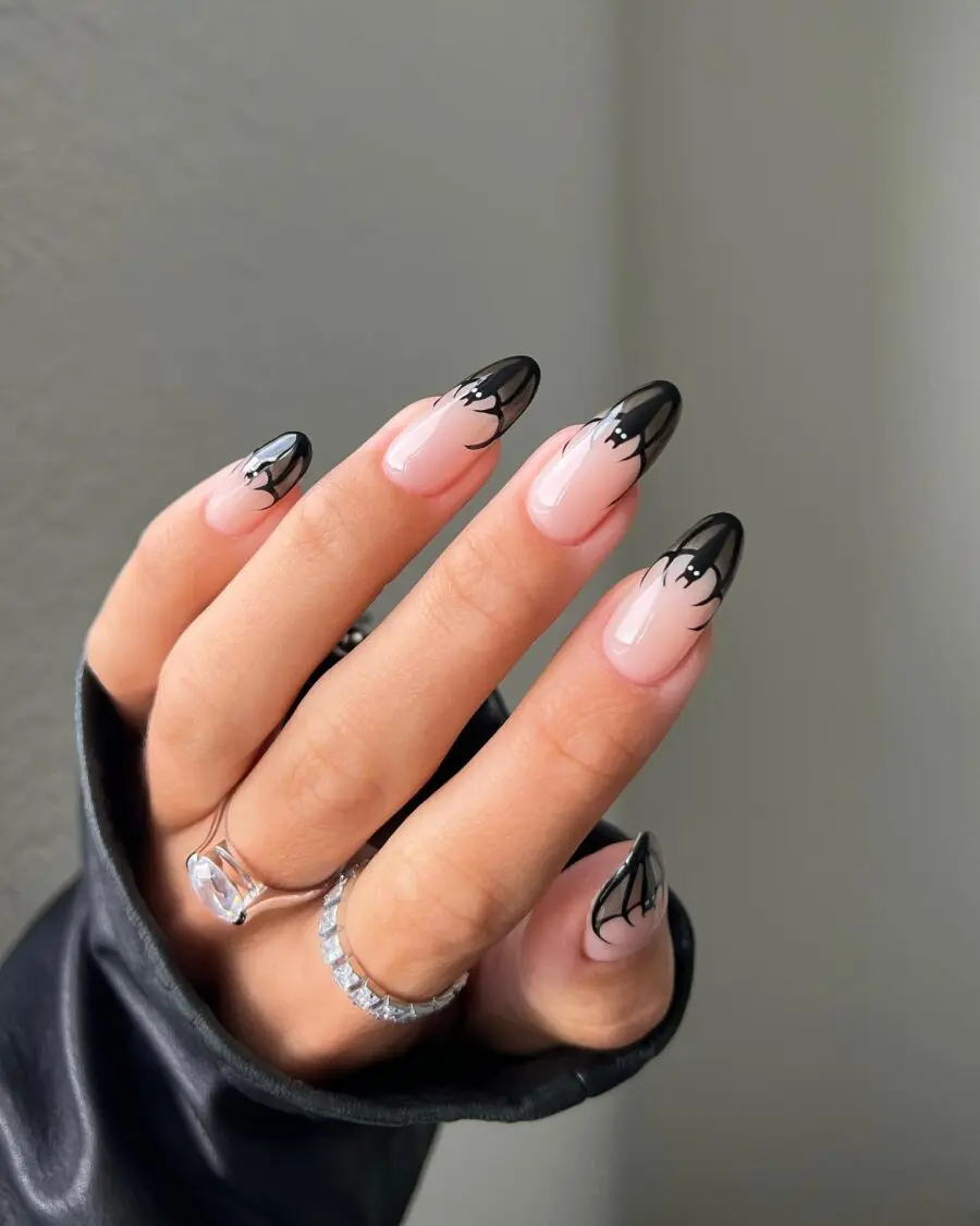 Trendy black-tipped nails with art