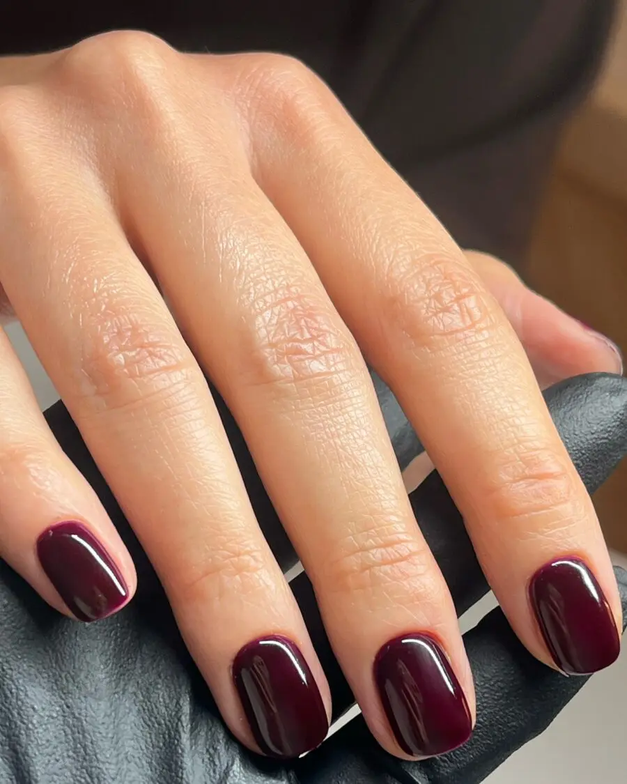 Chic burgundy nails with glossy finish