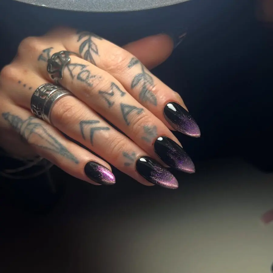 Glamorous dark nails with stunning glitter accents