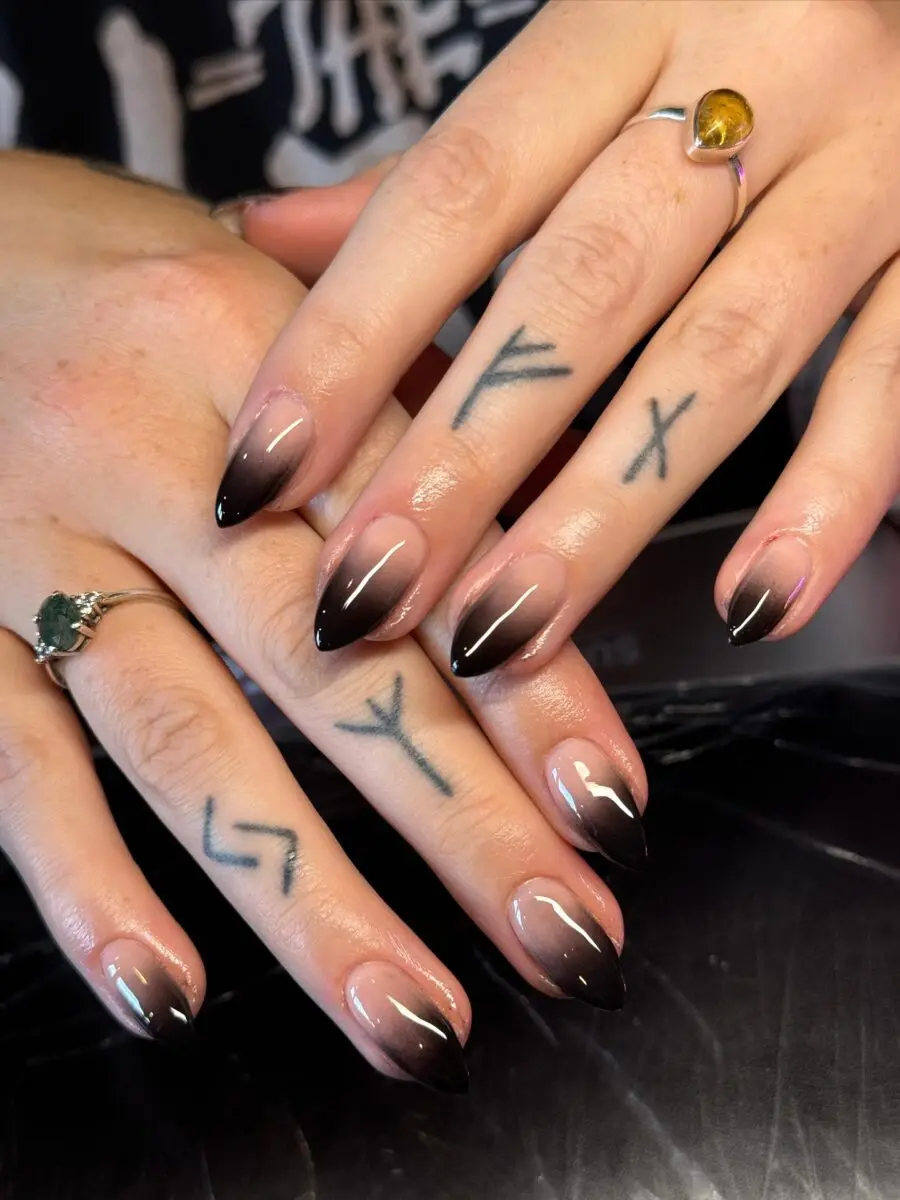 Stylish dark ombre nails with a chic twist