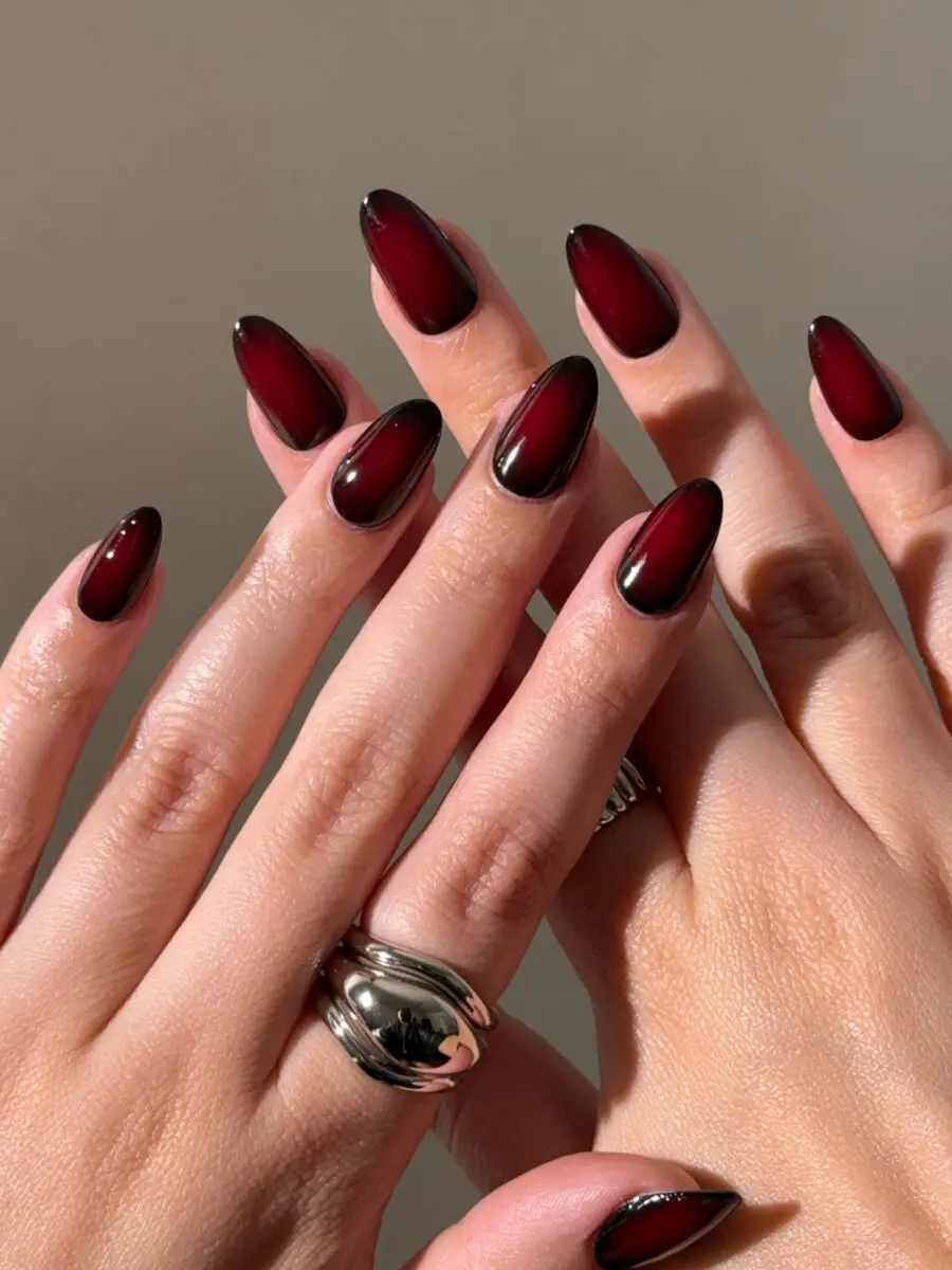 Glamorous dark ombre nails for a fierce vibe