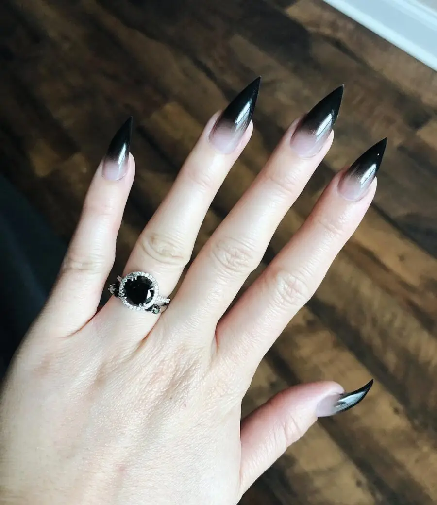 Elegant stiletto nails with dark gradient effect