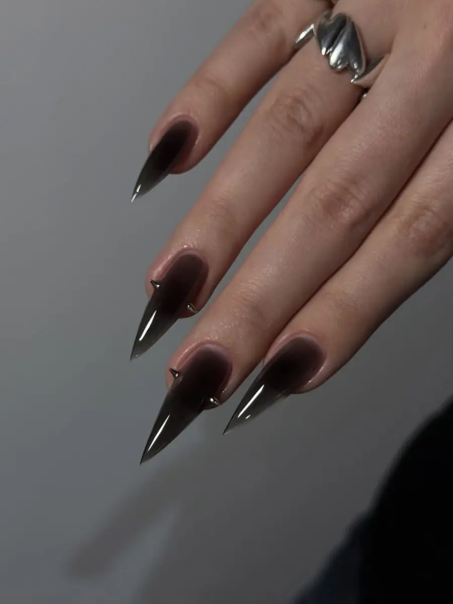 Edgy stiletto nails with dark ombre design