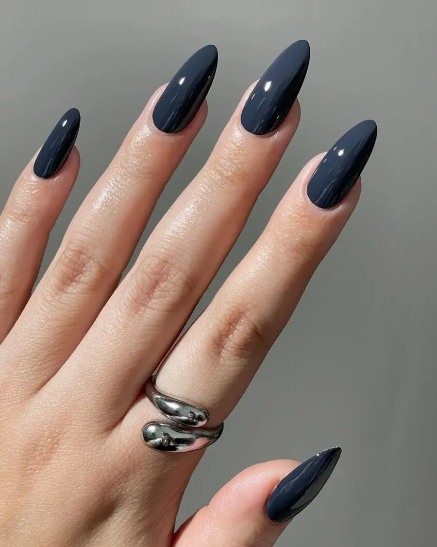 Elegant dark feminine nails with a glossy finish