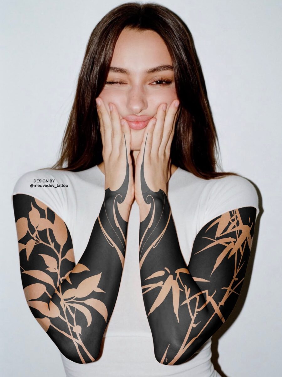 Elegant bamboo tattoos embody dark femininity.