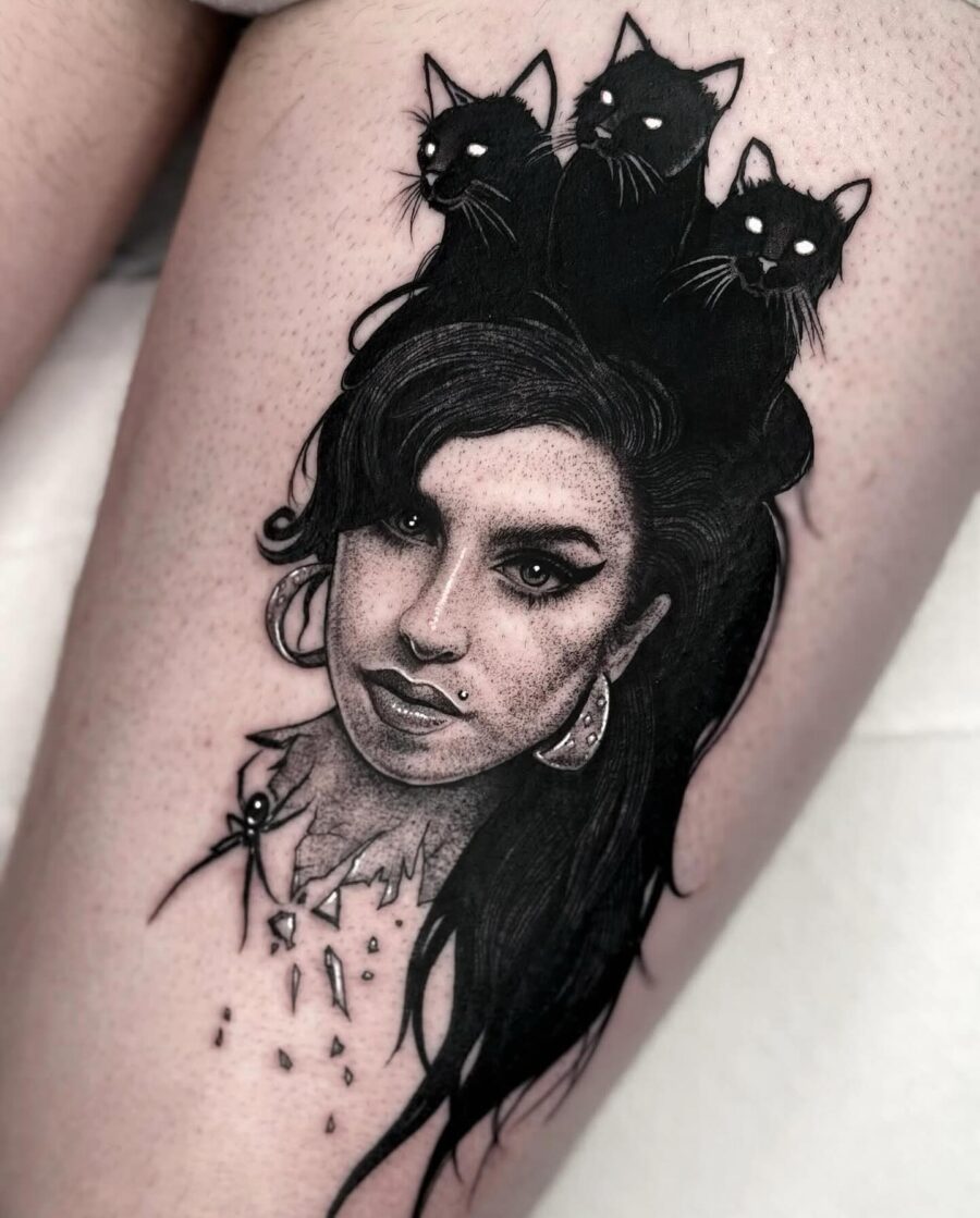 Mesmerizing dark feminine tattoo with black cats