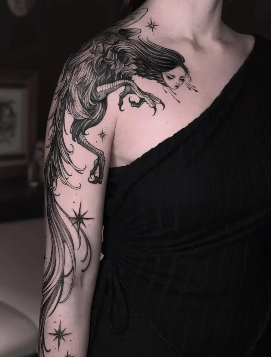 Enchanting dark feminine tattoo design on shoulder