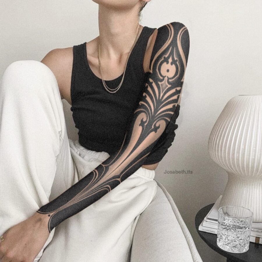 Elegant floral dark feminine tattoo design