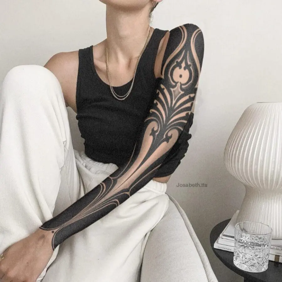 Elegant floral dark feminine tattoo design