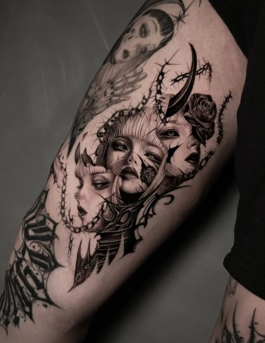 Intricate dark feminine tattoo with haunting faces