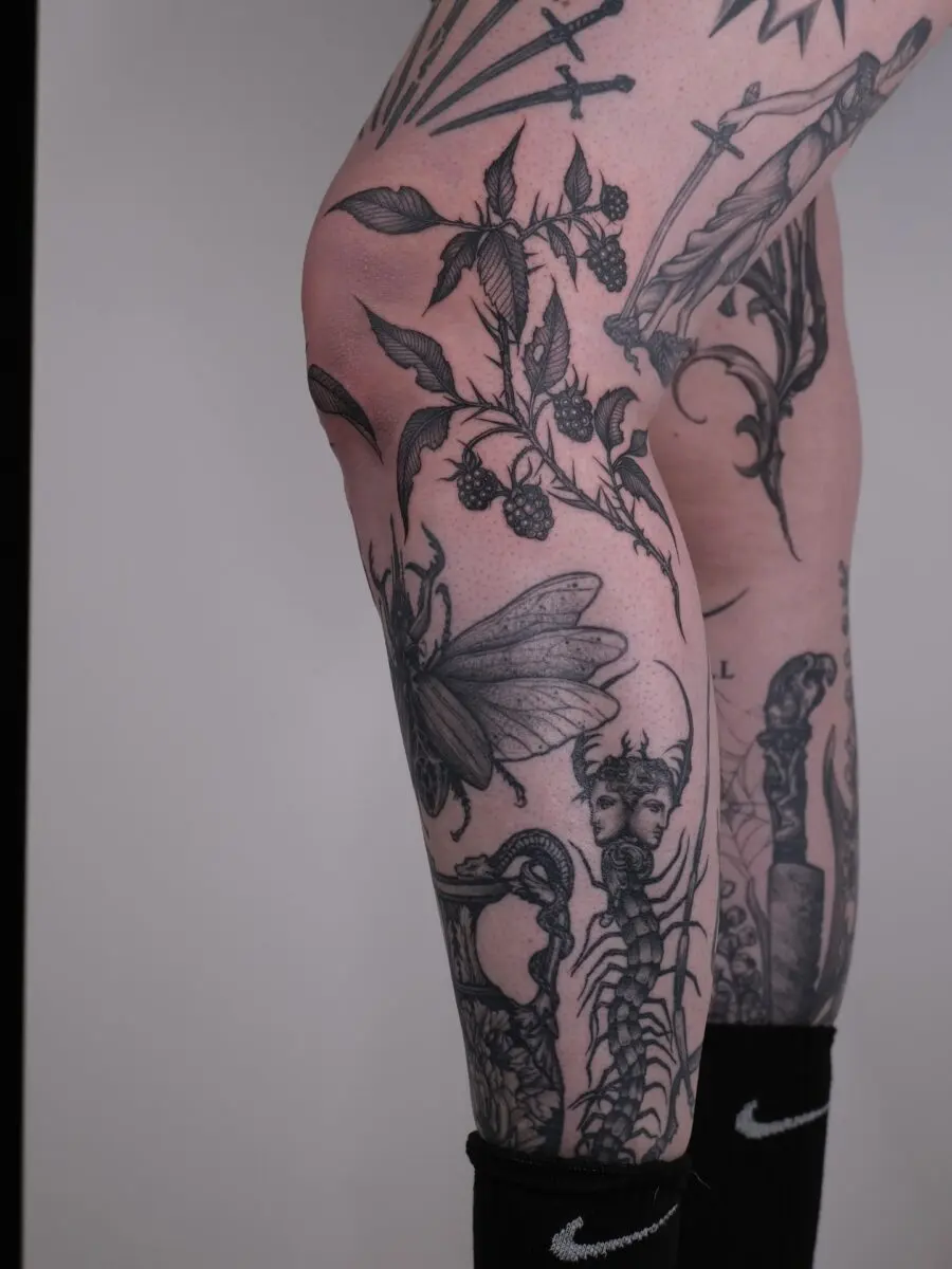 Intricate design blending nature and dark themes.