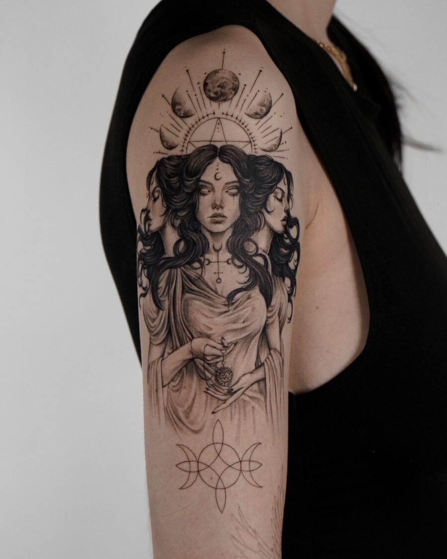 Mystical goddess tattoo with lunar elements