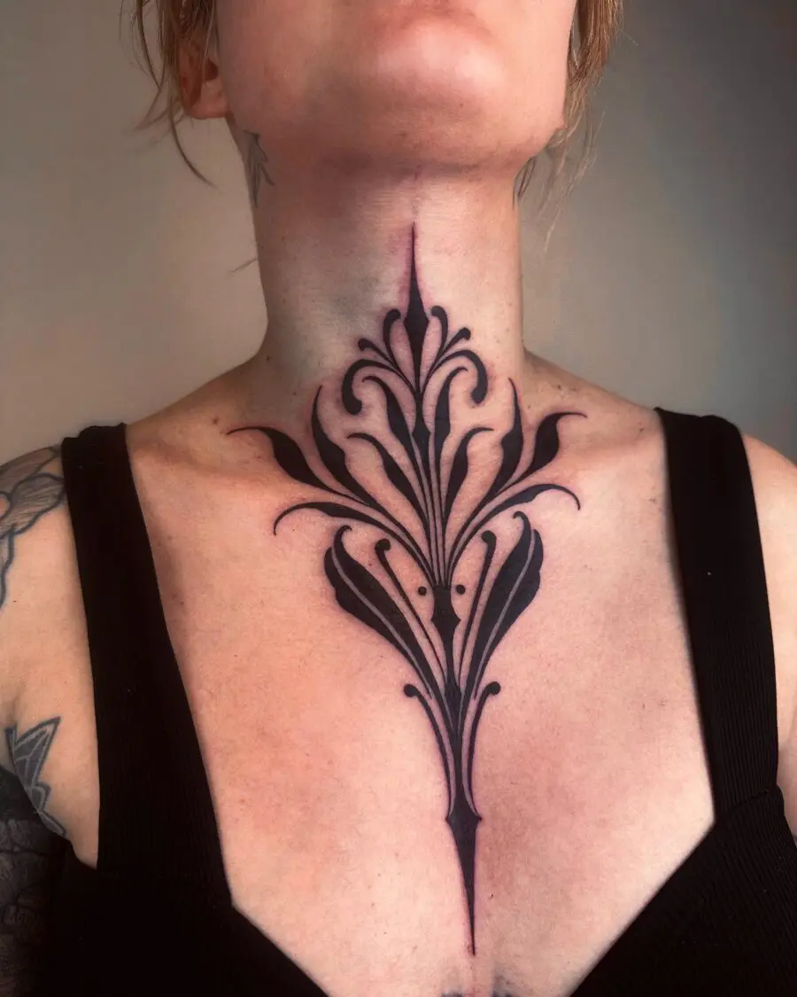 Intricate floral neck tattoo exuding dark elegance