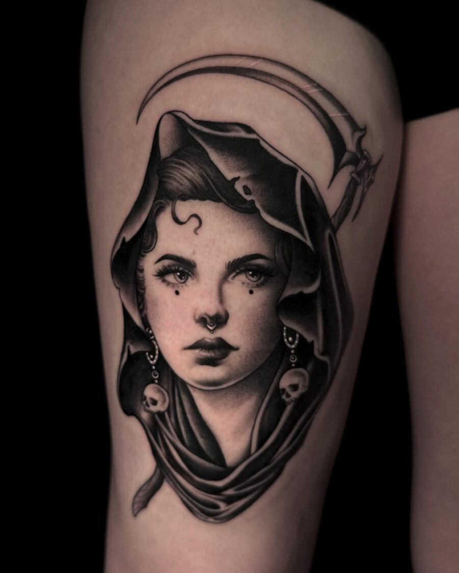 Enchanting dark feminine portrait with scythe