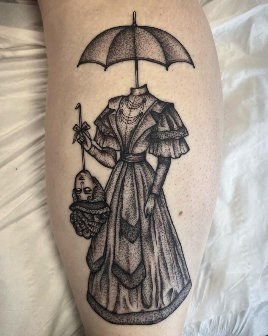 Intricate vintage dress tattoo with a twist
