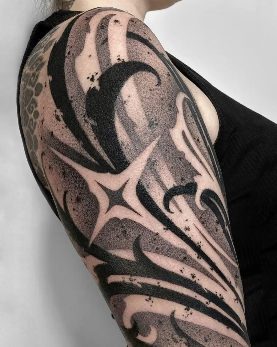 Bold floral and abstract tattoo design