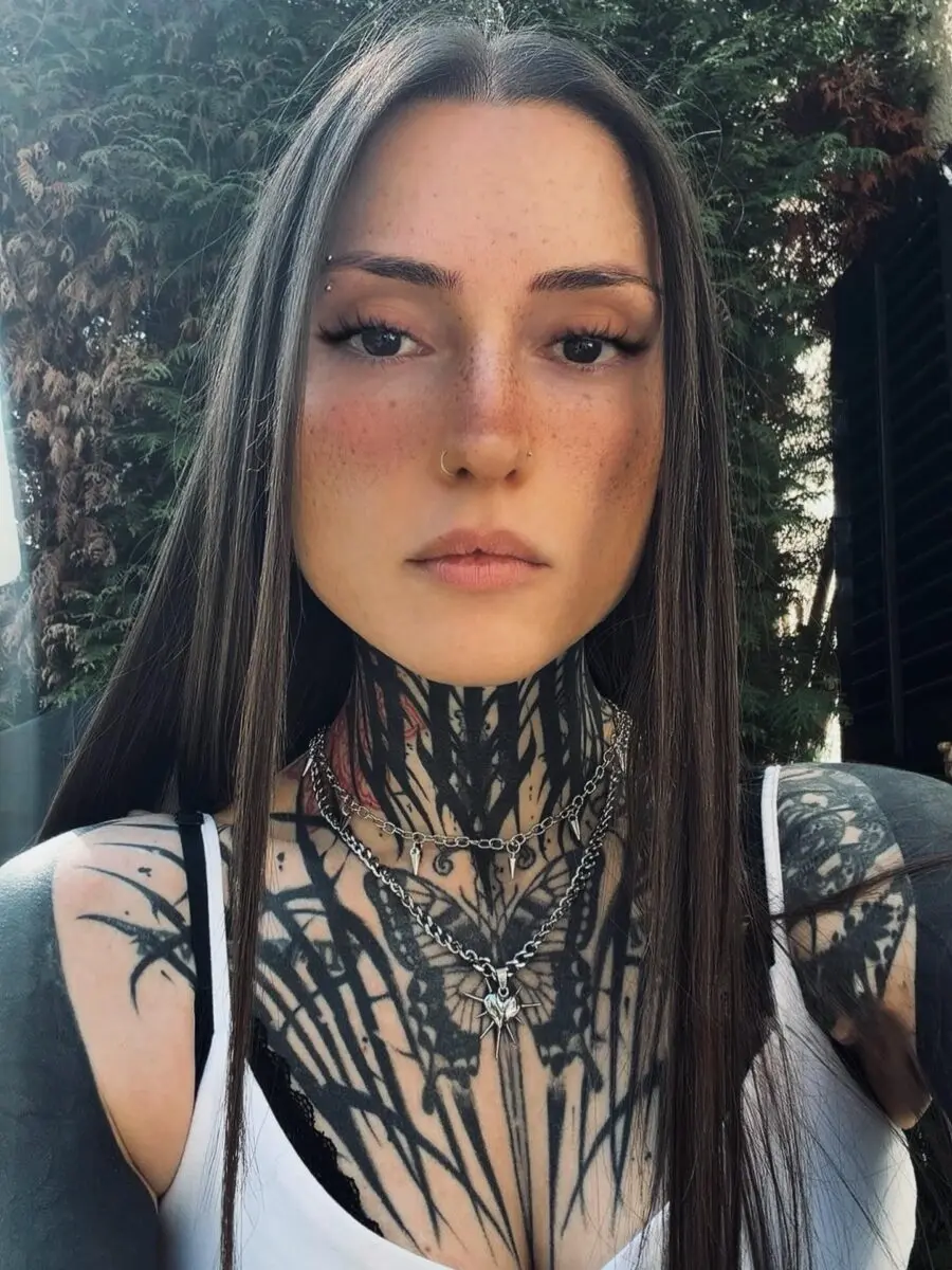 Captivating dark feminine tattoo artistry and vibes