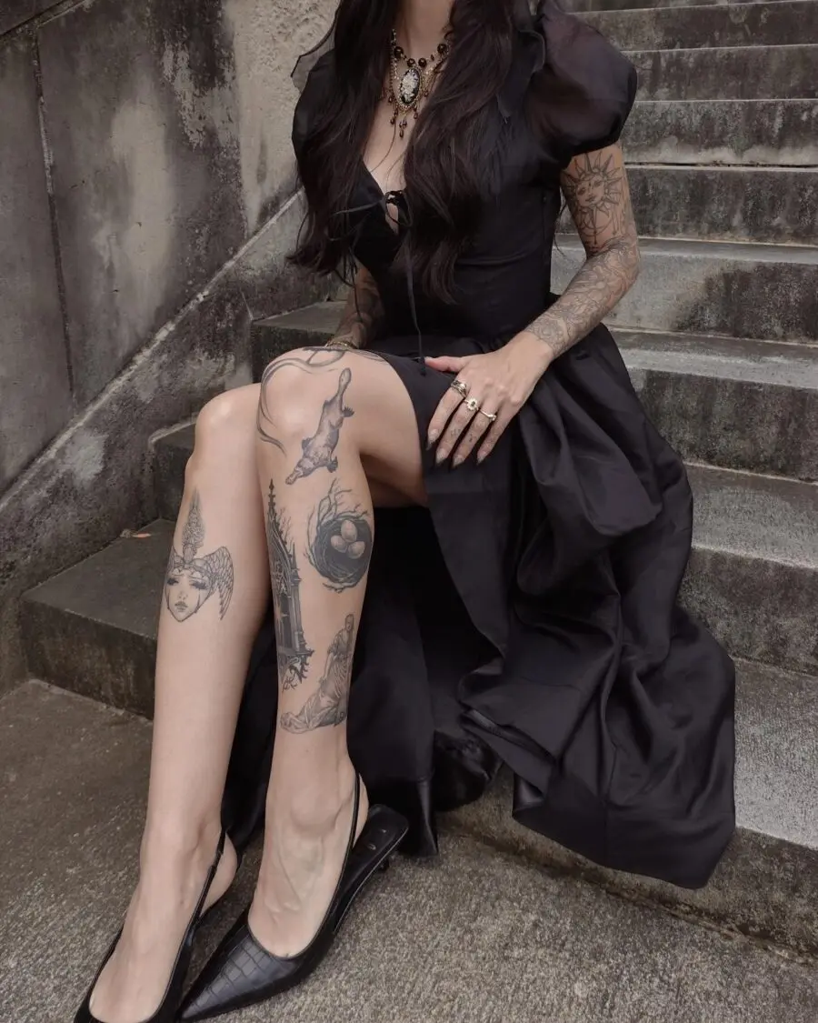 Elegant tattoos embodying dark feminine energy