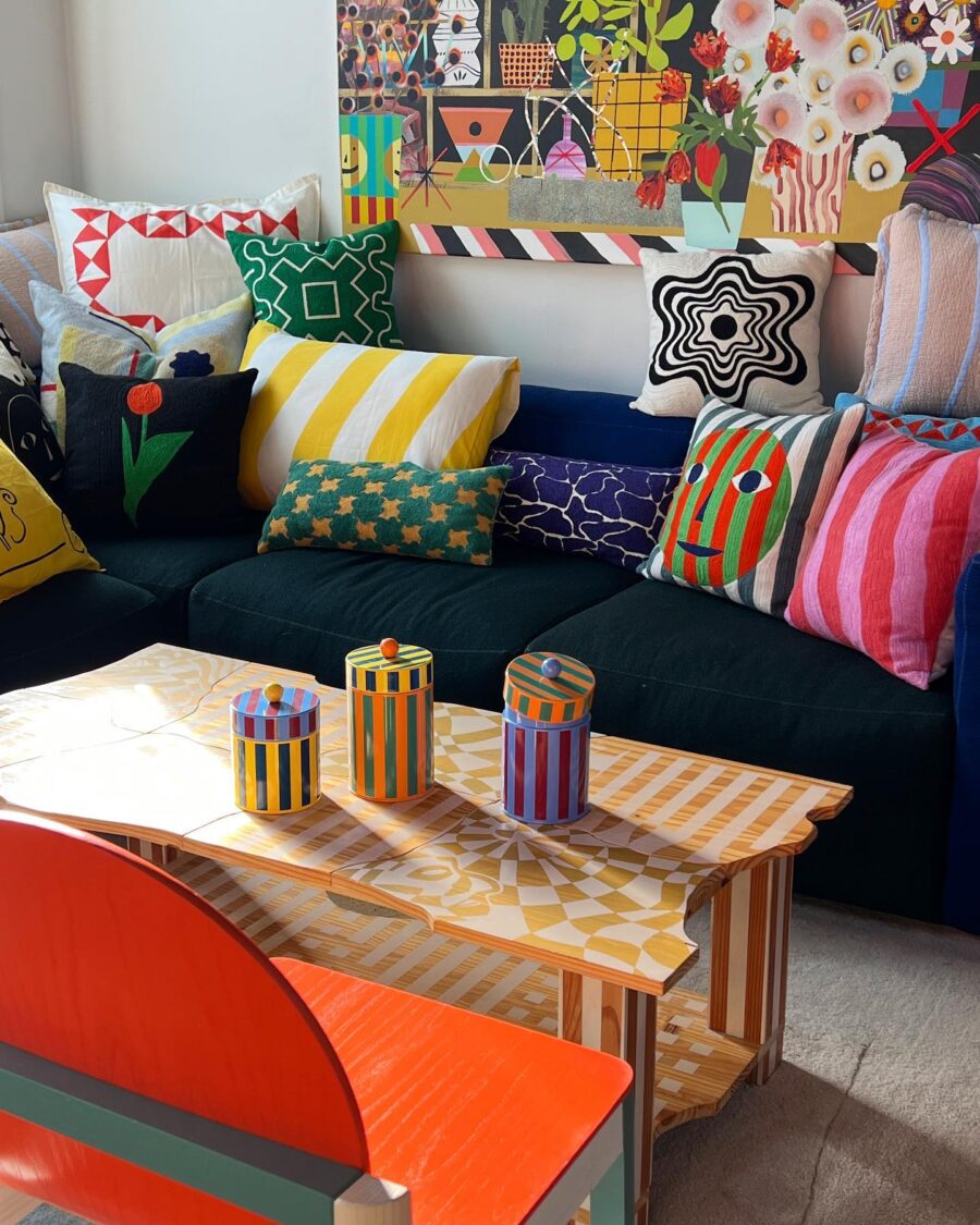 Colorful cushions and artistic coffee table delight