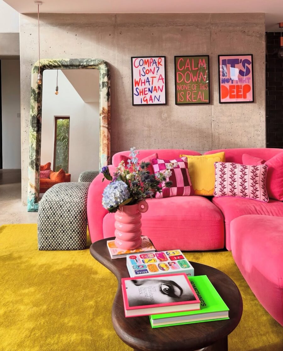 Vibrant pink living space with bold decor elements