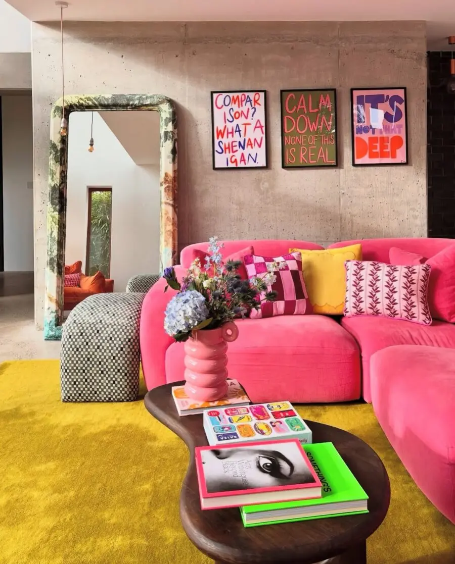 Vibrant pink living space with bold decor elements