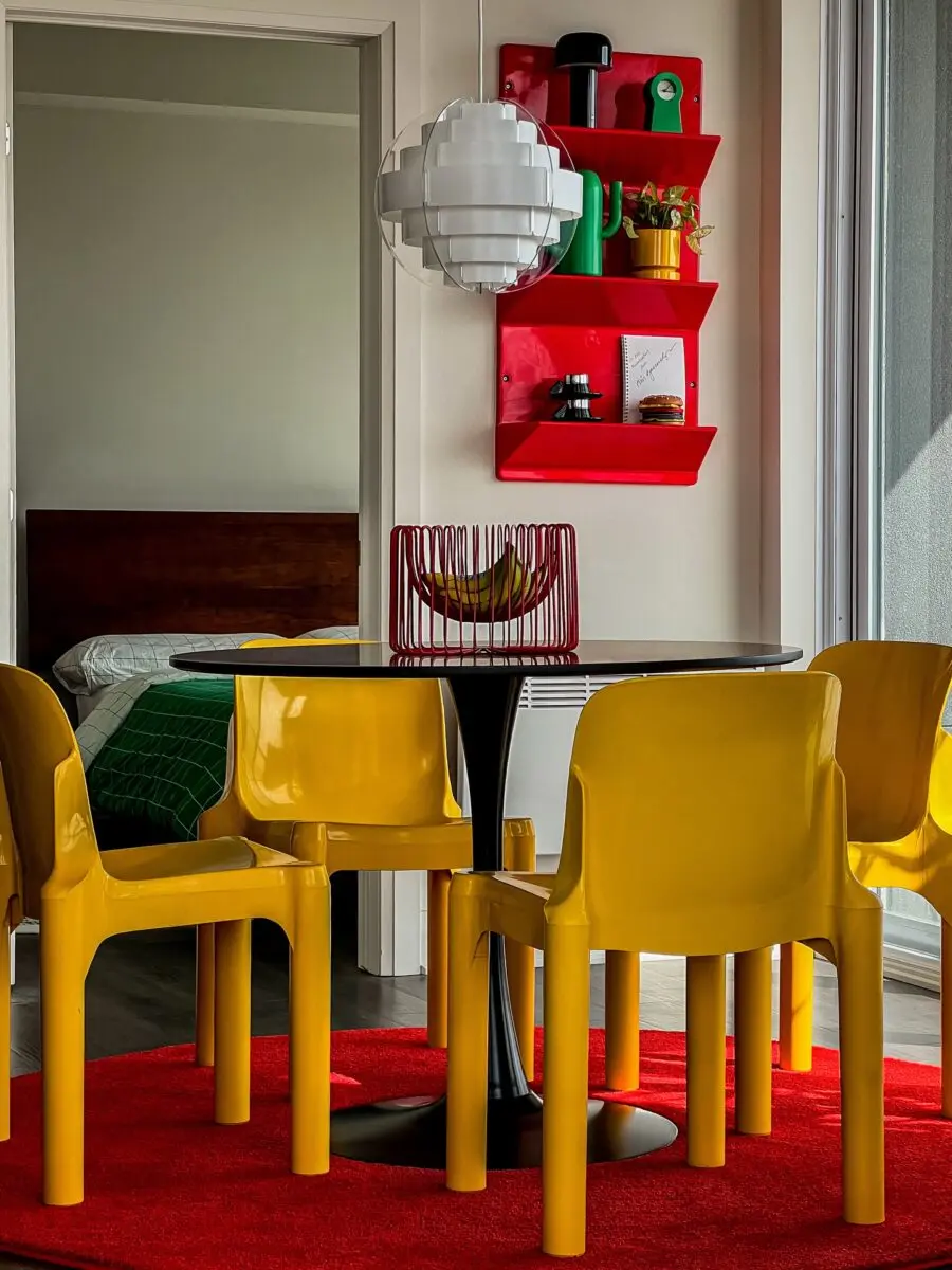 Vibrant dining area with playful yellow accents