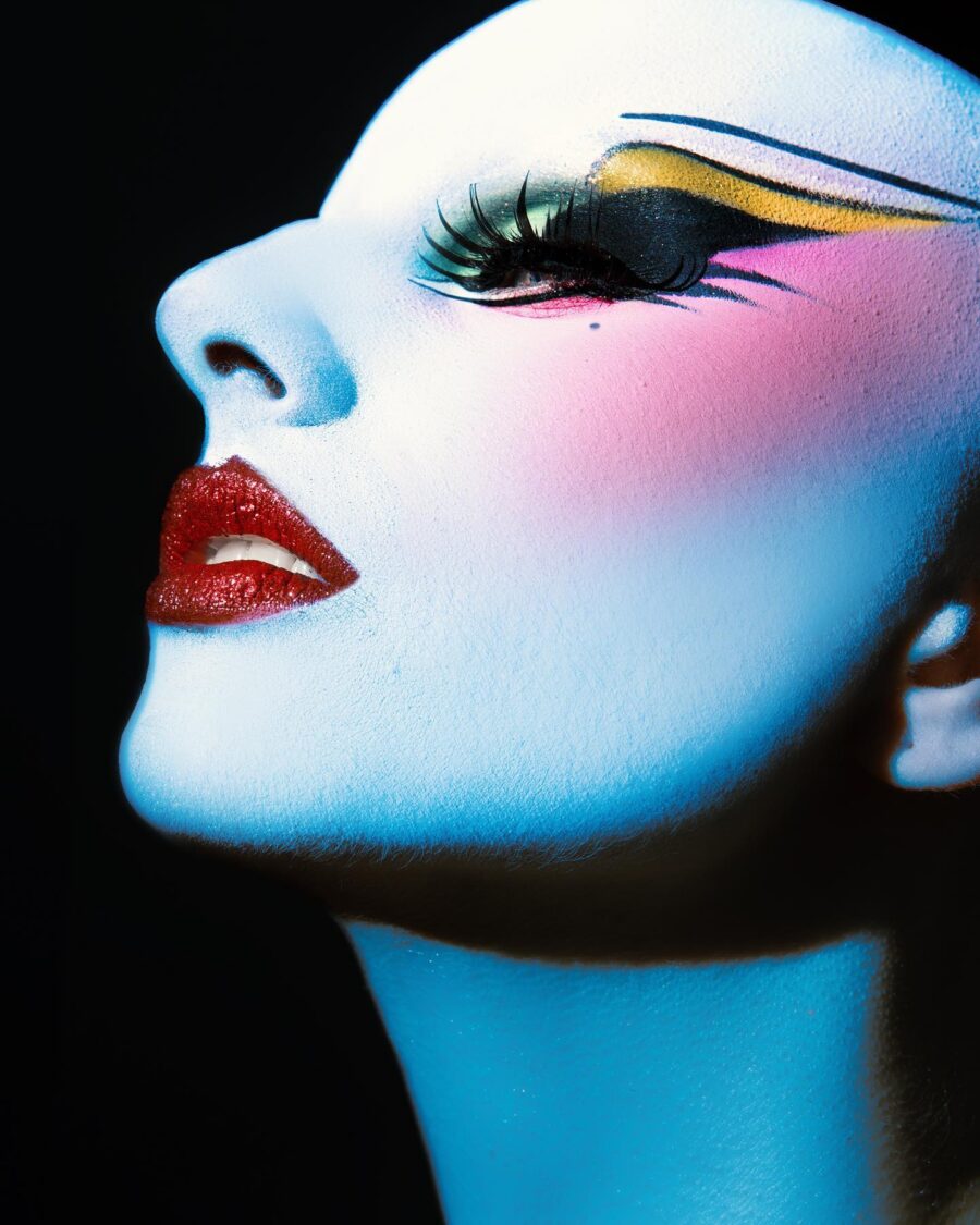 Dramatic blue and pink drag queen makeup