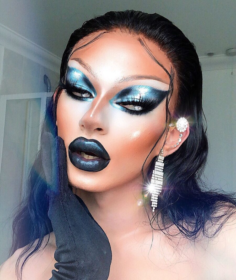 Striking blue glitter aesthetic with dramatic flair
