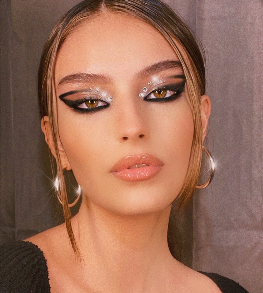 Glamorous dramatic eye makeup with sparkle