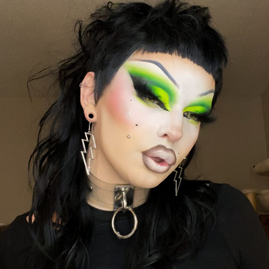 Bold green eyes with chic accessories