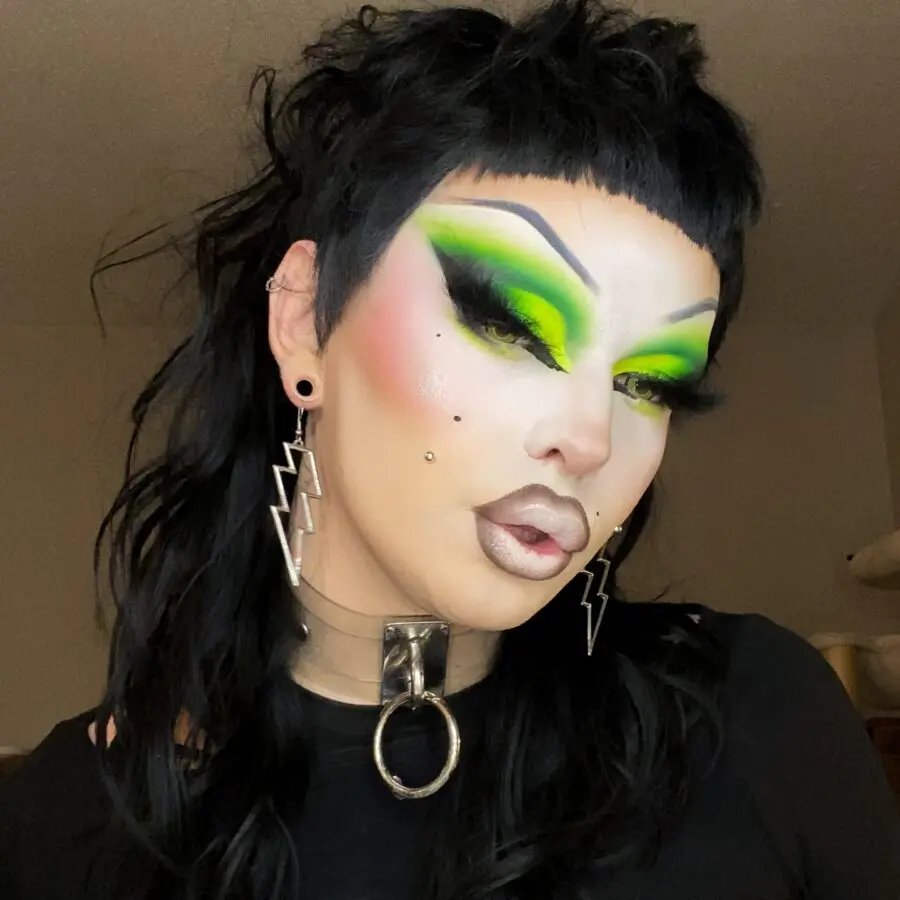Bold green eyes with chic accessories