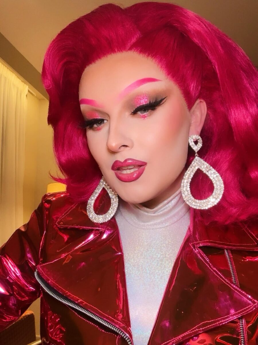Bold pink drag queen glam look.
