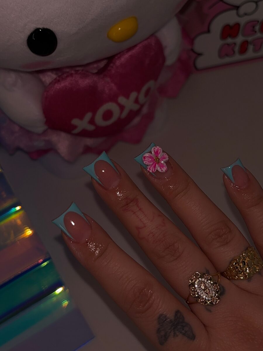 Vibrant Duck Nails with Floral Accent