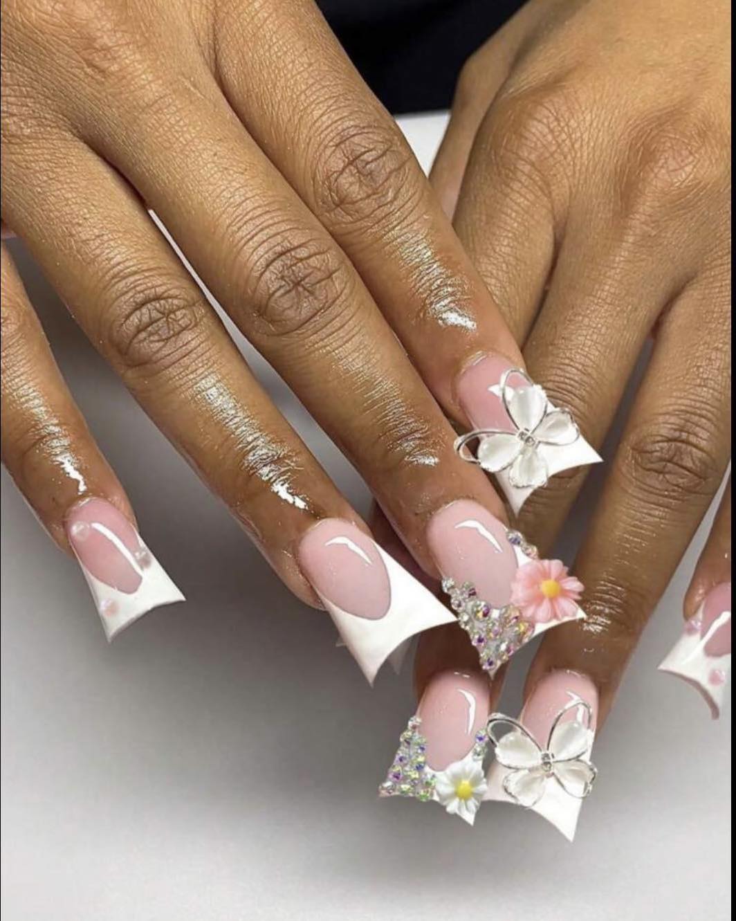 Chic Duck Nail Design Featuring Floral Accents