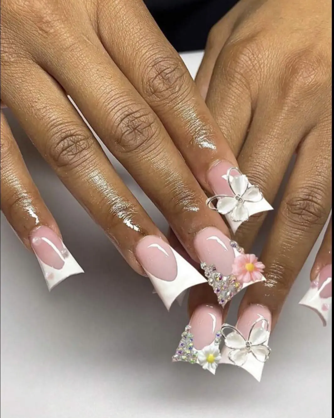 Chic Duck Nail Design Featuring Floral Accents