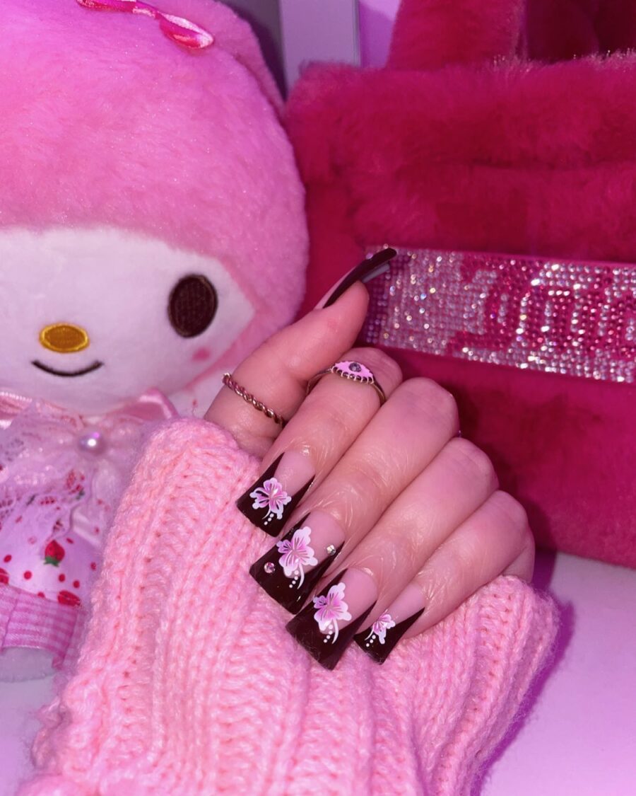 Chic duck nails with floral accents