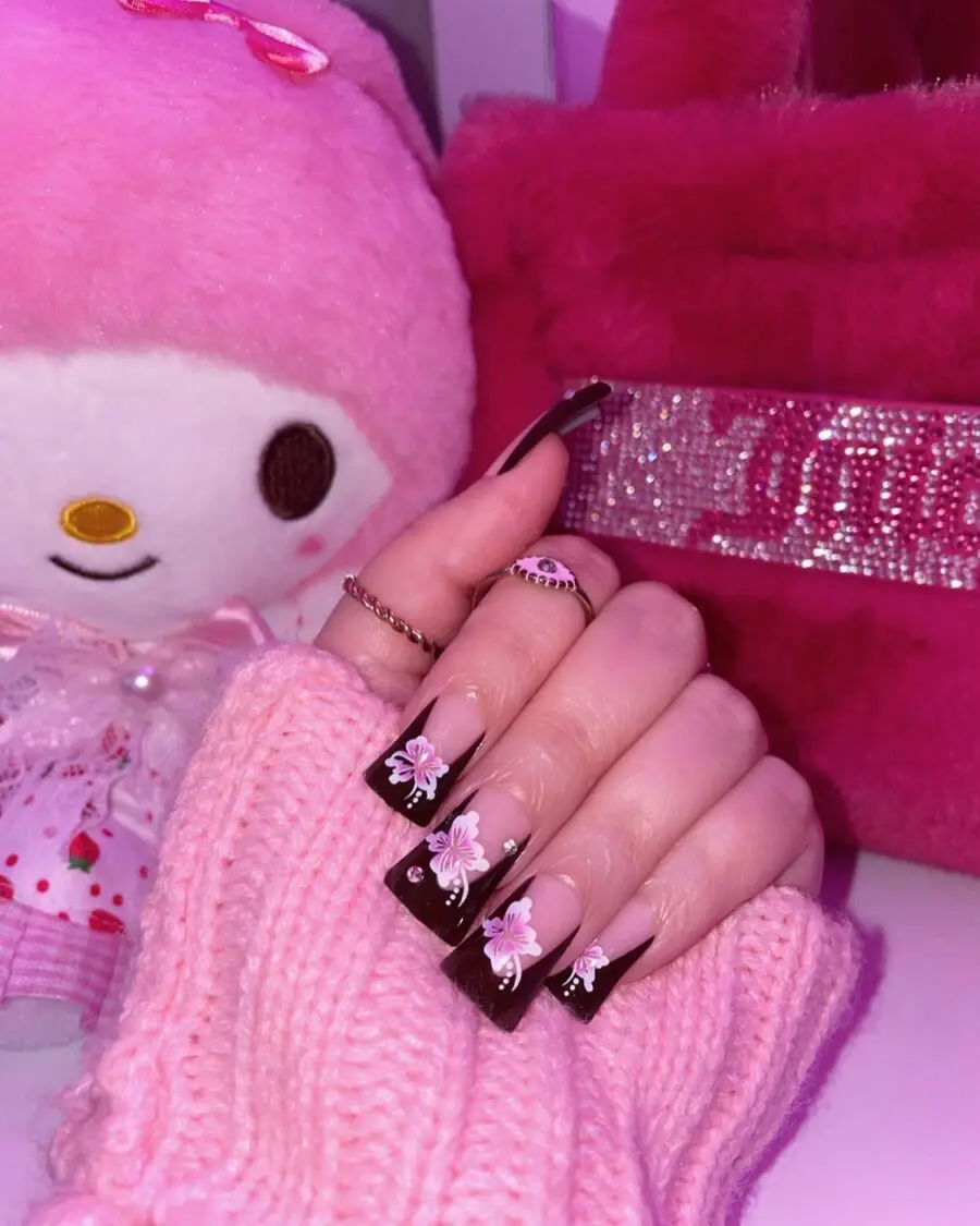 Chic duck nails with floral accents