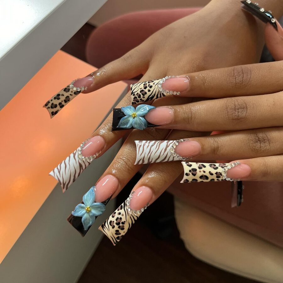 Stylish duck nails with bold animal prints