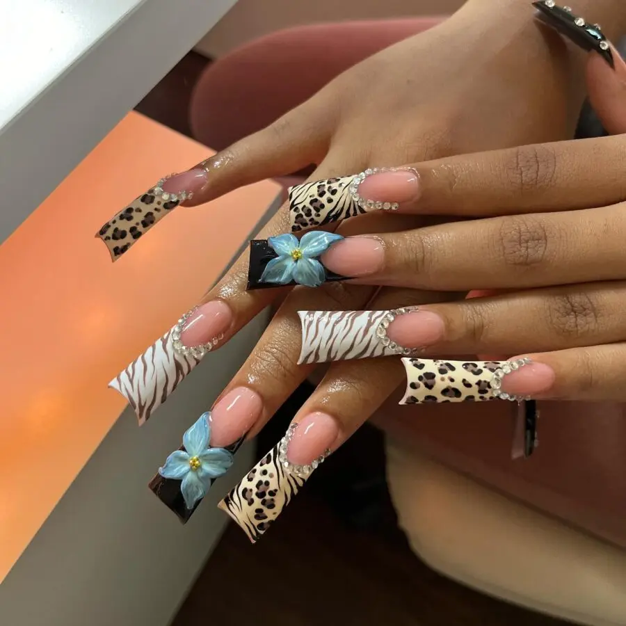 Stylish duck nails with bold animal prints