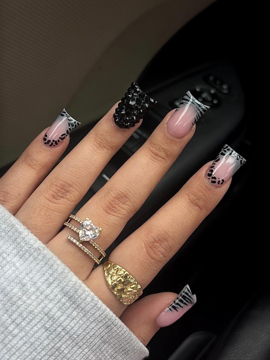Bold black and white duck nail art design