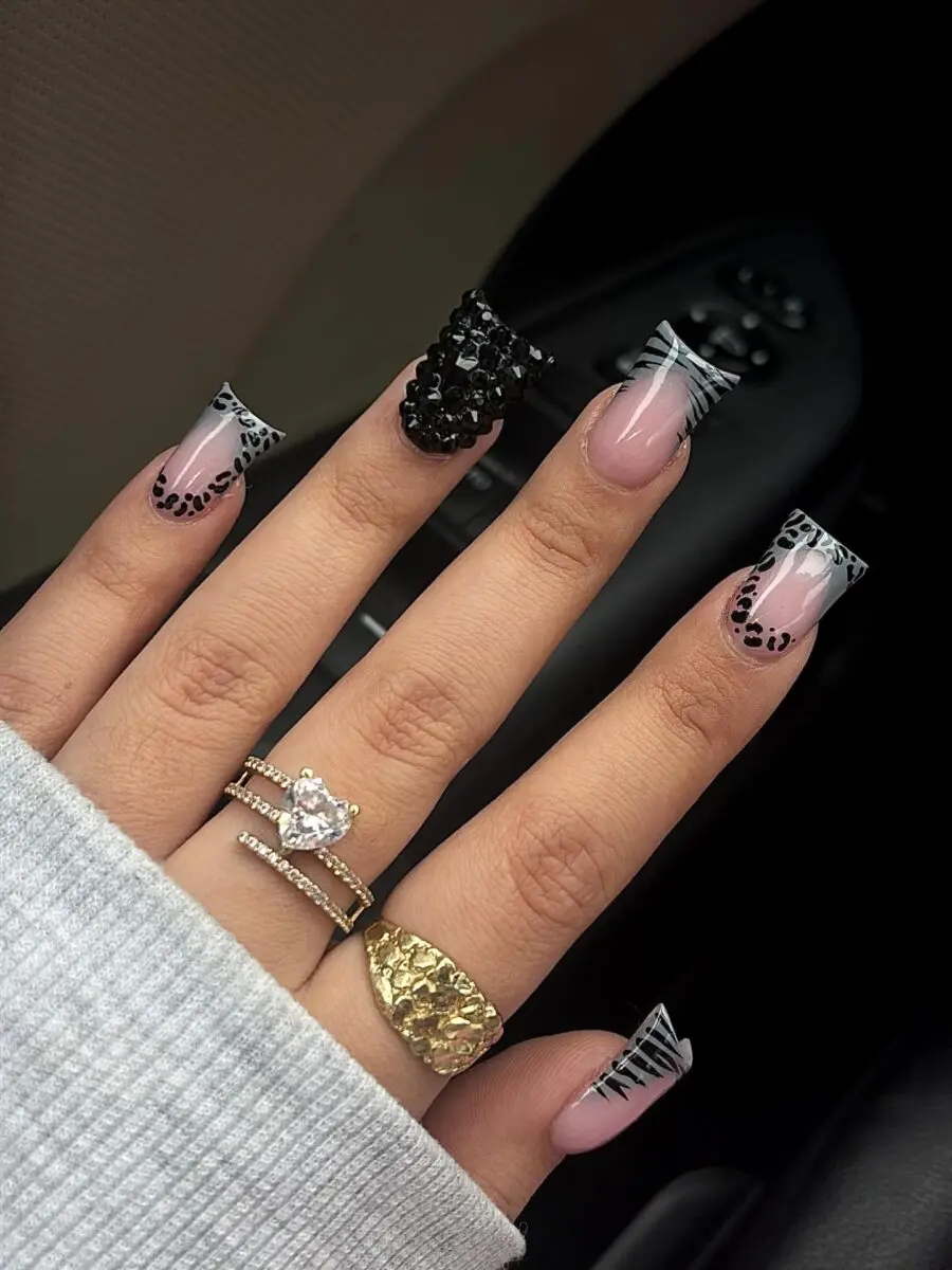 Bold black and white duck nail art design