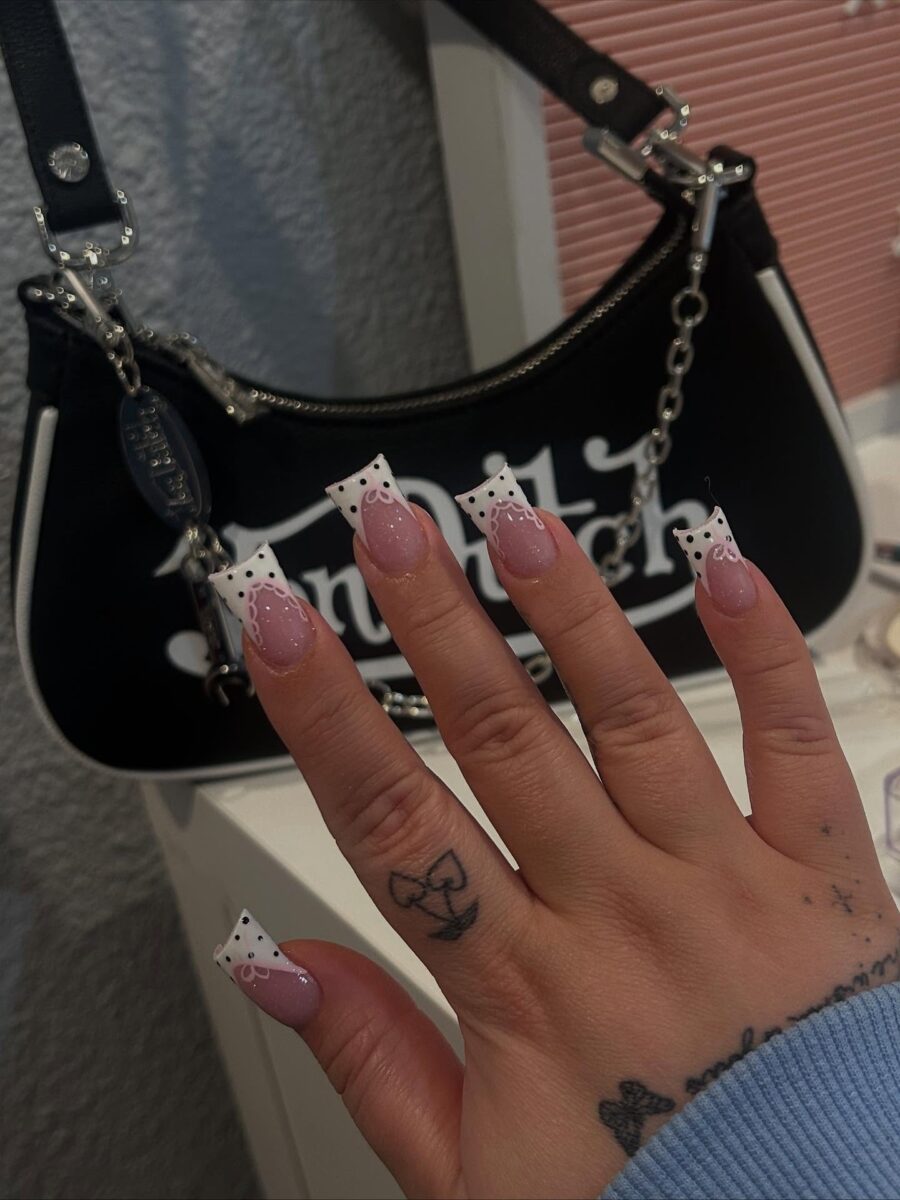 Stylish duck nails with playful accents