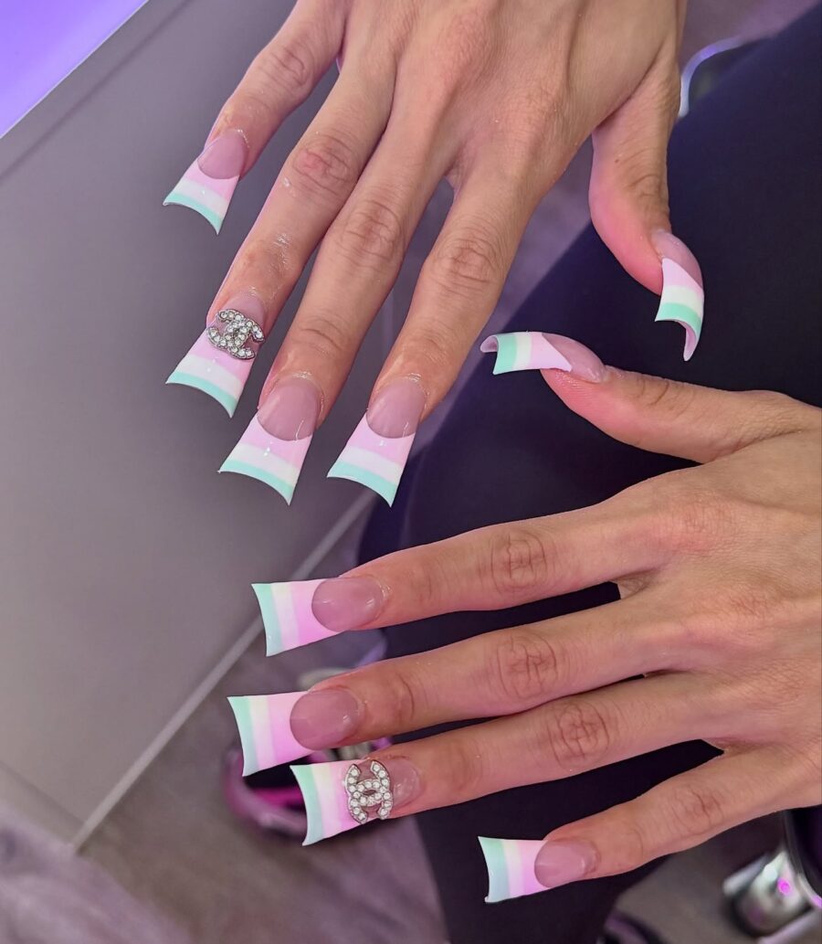 Vibrant duck nails with eye-catching designs