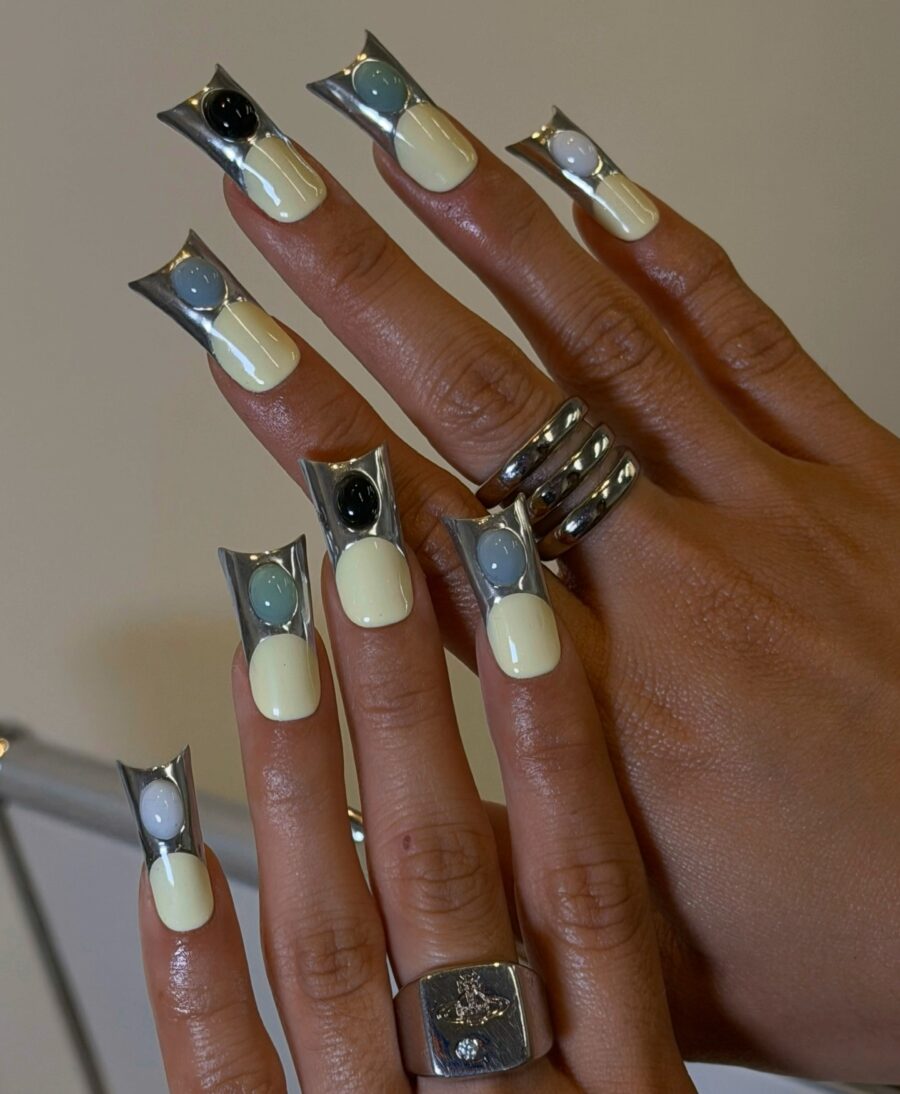 Stylish duck nails with unique metallic accents