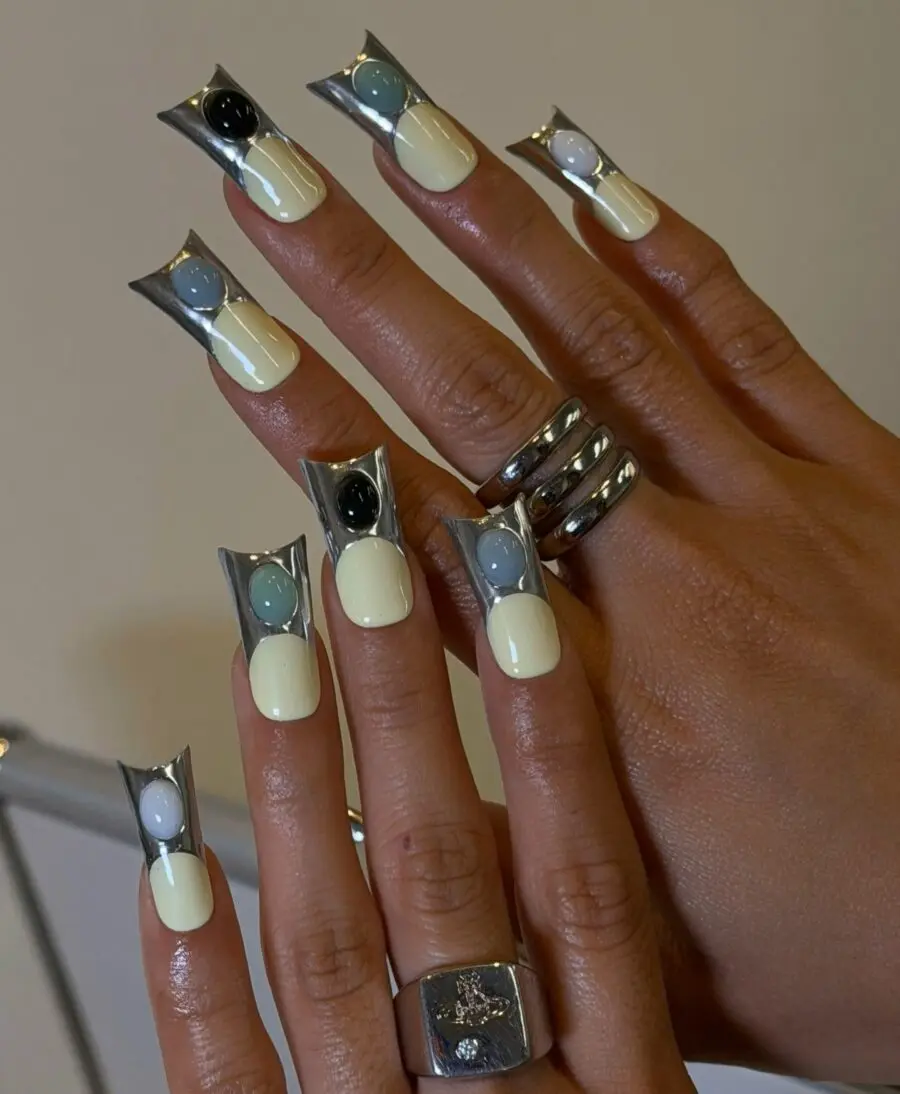 Stylish duck nails with unique metallic accents