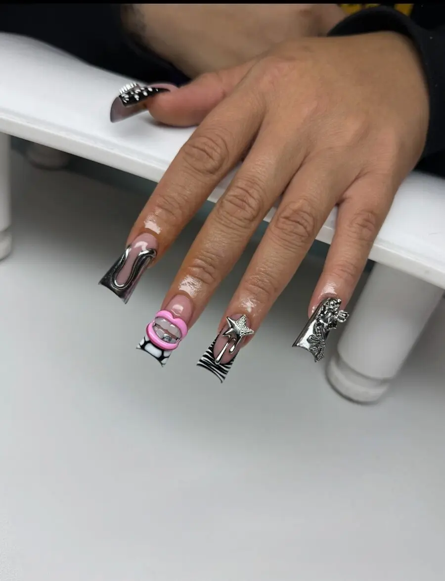 Trendy duck nails with creative embellishments