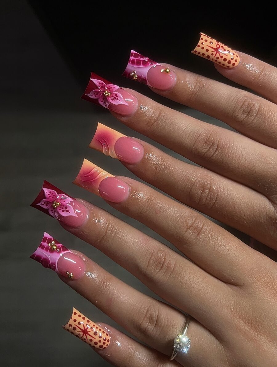 Stylish duck nails with floral patterns and colors