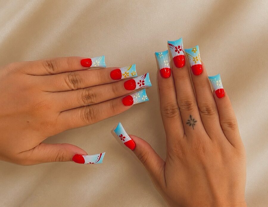 Colorful duck nails with floral accents