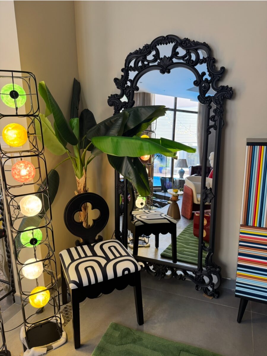 Elegant Black Mirror Enhances Living Space Charm